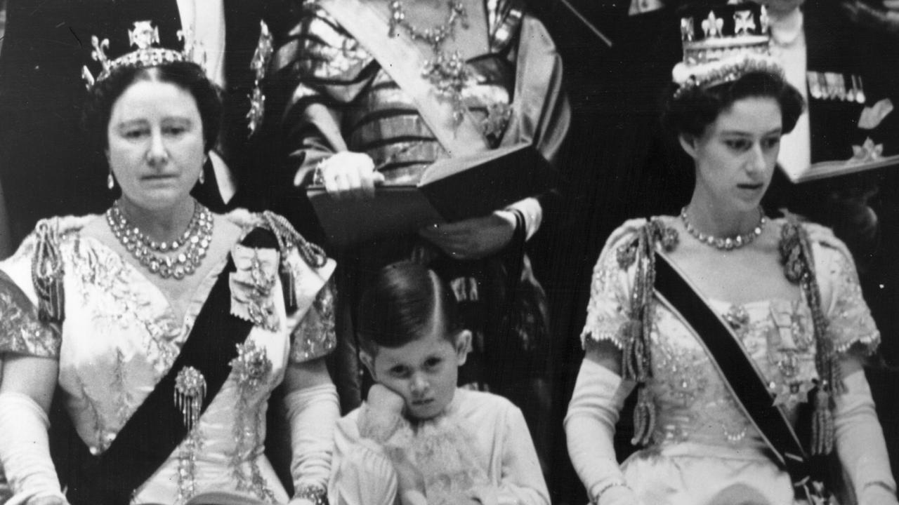 The Queen Mother and Princess Margaret with a bored Prince Charles in the royal box at Westminster Abbey watching the coronation of Queen Elizabeth II. Picture: Topical Press Agency/Getty Images