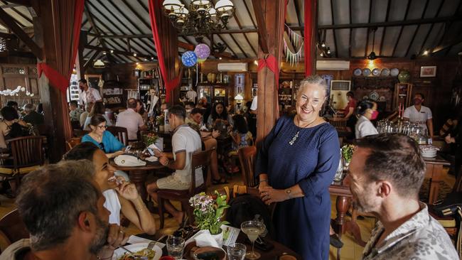 The owner of Biku Restaurant, Asri Kertayasa talks to her customer in Seminyak. Picture: Johannes P. Christo