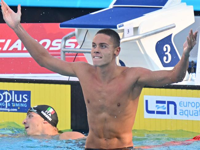 Romania's David Popovici reacts after winning and setting a new world record in the Men's 100m freestyle final event on August 13, 2022 at the LEN European Aquatics Championships. Picture: Alberto Pizzoli/AFP