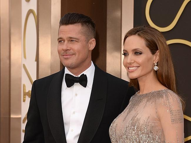 Brad Pitt and Angelina Jolie shine on the Oscars red carpet. 