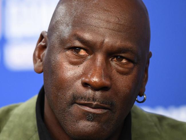 Former NBA star and owner of Charlotte Hornets team Michael Jordan looks on as he addresses a press conference ahead of the NBA basketball match between Milwakuee Bucks and Charlotte Hornets at The AccorHotels Arena in Paris on January 24, 2020. (Photo by FRANCK FIFE / AFP)