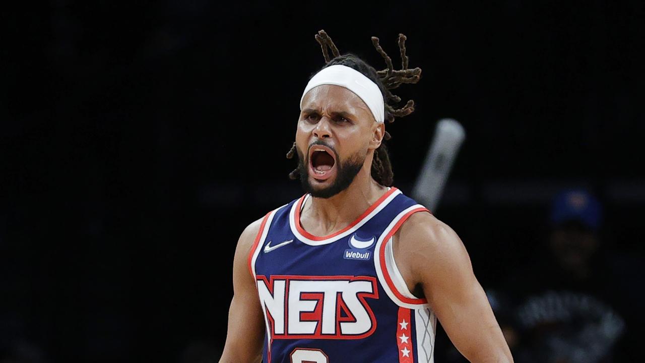 NEW YORK, NEW YORK - NOVEMBER 03: Patty Mills #8 of the Brooklyn Nets reacts during the second half against the Atlanta Hawks at Barclays Center on November 03, 2021 in the Brooklyn borough of New York City. NOTE TO USER: User expressly acknowledges and agrees that, by downloading and or using this photograph, user is consenting to the terms and conditions of the Getty Images License Agreement. (Photo by Sarah Stier/Getty Images)