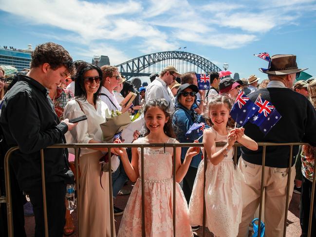 SYDNEY, AUSTRALIA – OCTOBER 22: Members of the public gather outside Sydney Opera House prior to a visit from King Charles III and Queen Camilla at the Sydney Opera House on October 22, 2024 in Sydney, Australia. The King's visit to Australia is his first as monarch, and the Commonwealth Heads of Government Meeting (CHOGM) in Samoa will be his first as head of the Commonwealth. (Photo by Roni Bintang/Getty Images)