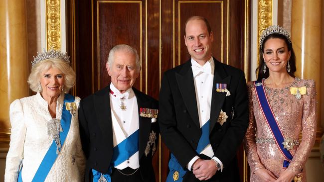 (From L) Britain's Queen Camilla, Britain's King Charles III, Britain's Prince William, Prince of Wales and Britain's Catherine, Princess of Wales pose for a picture during a reception for members of the Diplomatic Corps at Buckingham Palace, in London, on December 5, 2023. (Photo by Chris Jackson / POOL / AFP) / RESTRICTED TO EDITORIAL USE  - NO MARKETING NO ADVERTISING CAMPAIGNS - DISTRIBUTED AS A SERVICE TO CLIENTS - THE IMAGE SHALL NOT BE USED AFTER 0001hrs, TUESDAY 26th DECEMBER