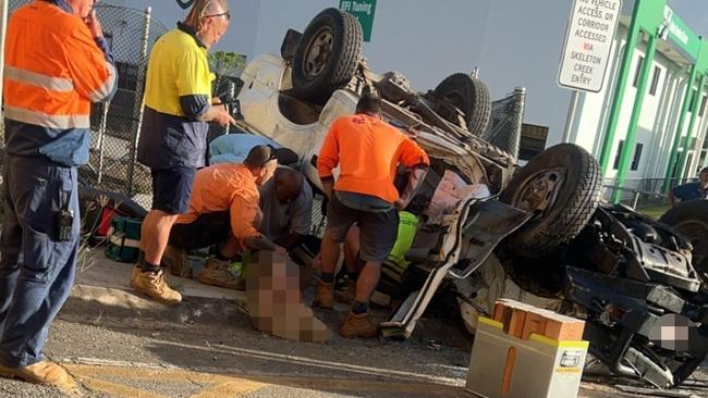 A freight train and car collided at a level crossing on Swallow Road, near the Bruce Highway, at Bentley Park, on Monday morning, leaving two men with life-threatening injuries. Picture: Supplied.