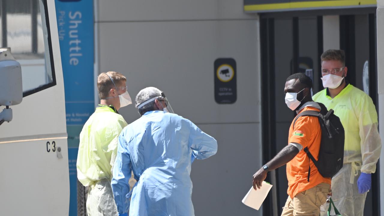 Vanuatu workers arrive at Darwin Airport. Picture Julianne Osborne