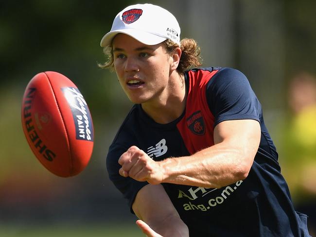 MELBOURNE, AUSTRALIA - NOVEMBER 17: Jayden Hunt of the Demons handballs during a Melbourne Demons AFL training session  at Gosch's Paddock on November 17, 2017 in Melbourne, Australia.  (Photo by Quinn Rooney/Getty Images)