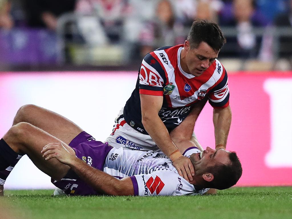 Cooper Cronk and Cameron Smith during the 2018 NRL Grand Final.