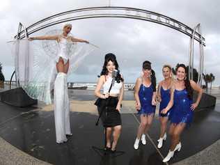 Stephanie Long as Amy Winehouse (centre)  , Alyssa Morgan - Showgirl Glamazon on stilts (left) and Paula McGregor, Mandy Woodend and Lea Armstrong from the Beehives (right) preparing for Viva in Surfers ParadisePhotograph : Jason O'Brien. Picture: GCB - Jason O'Brien