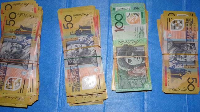 Money allegedly seized from the Condell Park house.