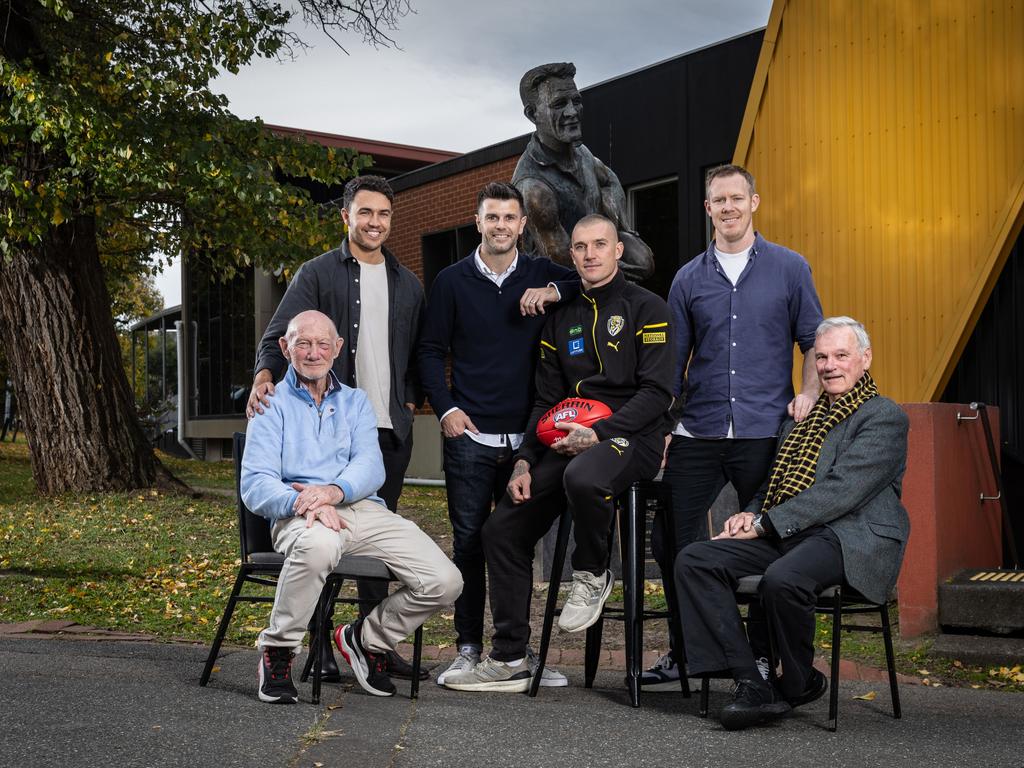 Dustin Martin with fellow Richmond 300 game players Kevin Bartlett, Shane Edwards, Trent Cotchin, Jack Riewoldt and Francis Bourke in front of a statue of Jack Dyer. Picture: Michael Willson