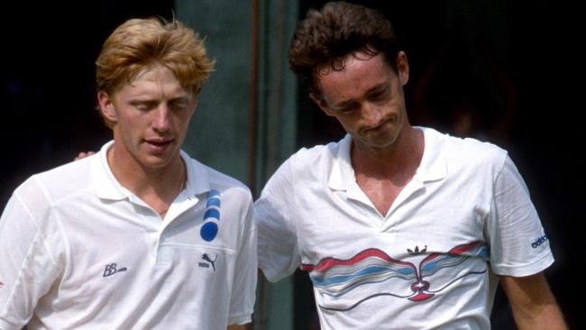 Peter Doohan walks off with Boris Becker after beating the defending champion. Picture: Getty