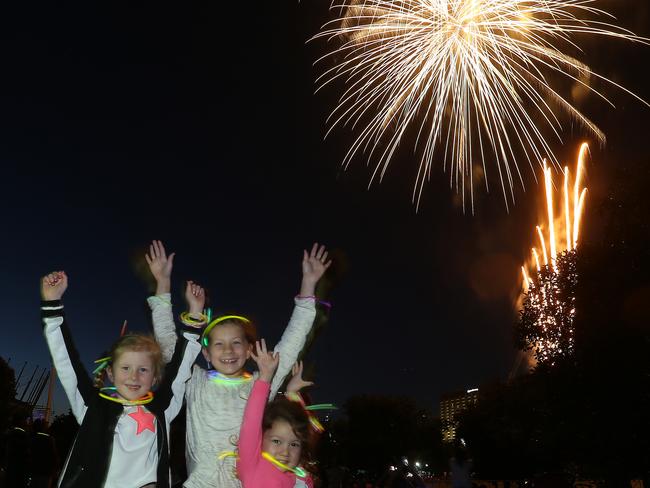 Marlii, 8, Lucy, 6, and Indie, 3, from Montrose enjoy the display at Yarra Park. Picture: Yuri Kouzmin