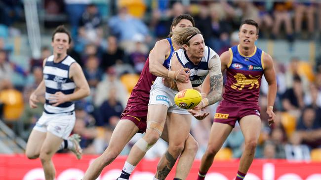 BRISBANE, AUSTRALIA - JULY 22: Tom Stewart of the Cats in action during the 2023 AFL Round 19 match between the Brisbane Lions and the Geelong Cats at The Gabba on July 22, 2023 in Brisbane, Australia. (Photo by Russell Freeman/AFL Photos via Getty Images)