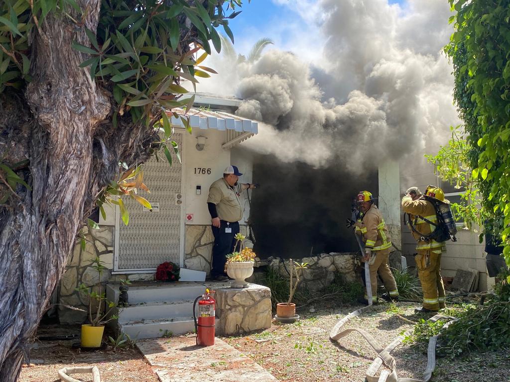 Firefighters work to contain the fire at Lynne Mishele’s LA home. Picture: GoFundMe