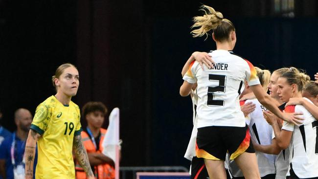 Germany's players celebrat in the women's group B football match between Germany and Australia during the Paris 2024 Olympic Games at the Marseille Stadium in Marseille on July 25, 2024. (Photo by Christophe SIMON / AFP)