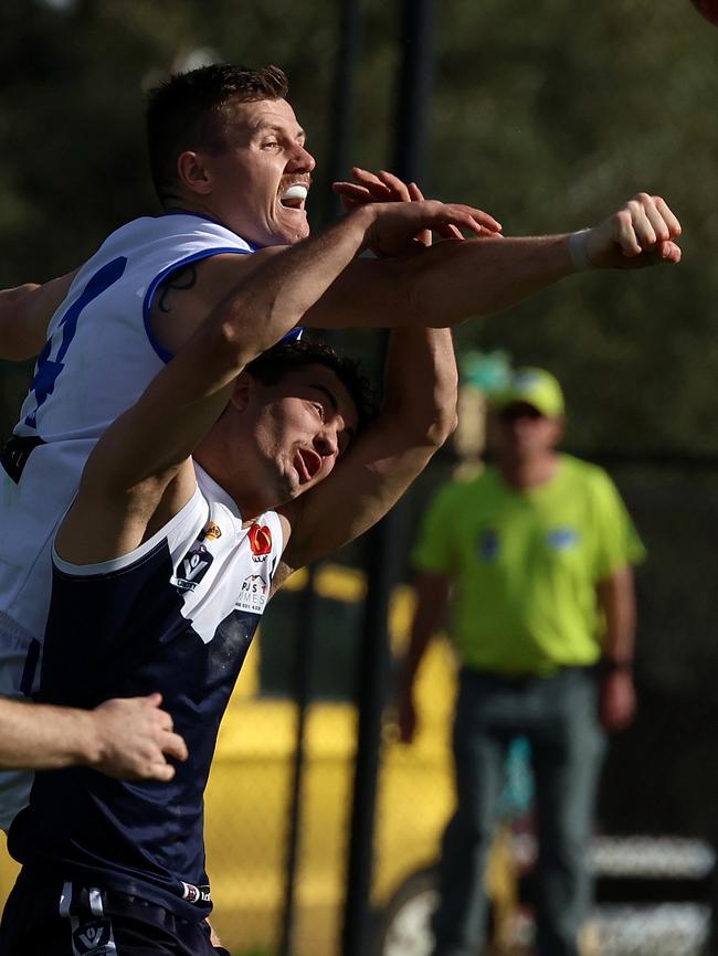 Ballarat: Sunbury’s Tyson Lever spoils Mitch Fino of Melton South. Picture: Hamish Blair