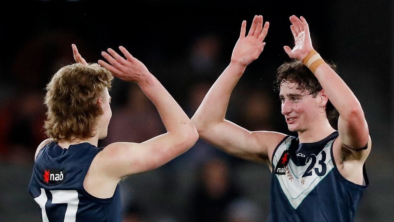 MELBOURNE, AUSTRALIA – SEPTEMBER 22: Bailey Macdonald with Elijah Tsatas of during the 2022 U18 Championships. (Photo by Dylan Burns/AFL Photos via Getty Images)