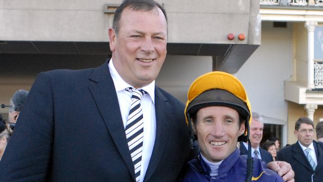 Damien Oliver with Michael Moroney at Randwick in 2008 when Sarrera won the Group 1 Queen Elizabeth Stakes.