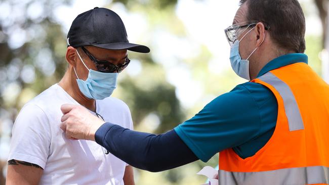 A man in line at the Sydney Olympic Park Vaccination Hub to get the jab. Picture: NCA NewsWire/Gaye Gerard