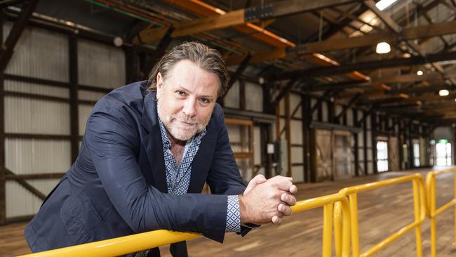 Music promoter and Powderfinger bassist John Collins inside The Goods Shed during a tour of the city's potential live music venues, Friday, May 6, 2022. Picture: Kevin Farmer