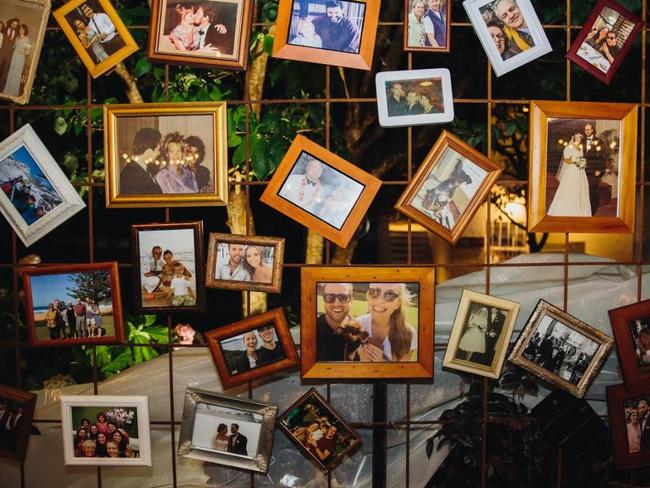 Ariana and Angus used second-hand frames to create a decorative feature wall with photos of their guests. Picture: Jack Chauvel