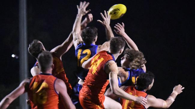 Players fly for the footy in the South Queensland vs North Queensland men's intrastate representative clash at Bond University Oval. Picture: Highflyer Images.