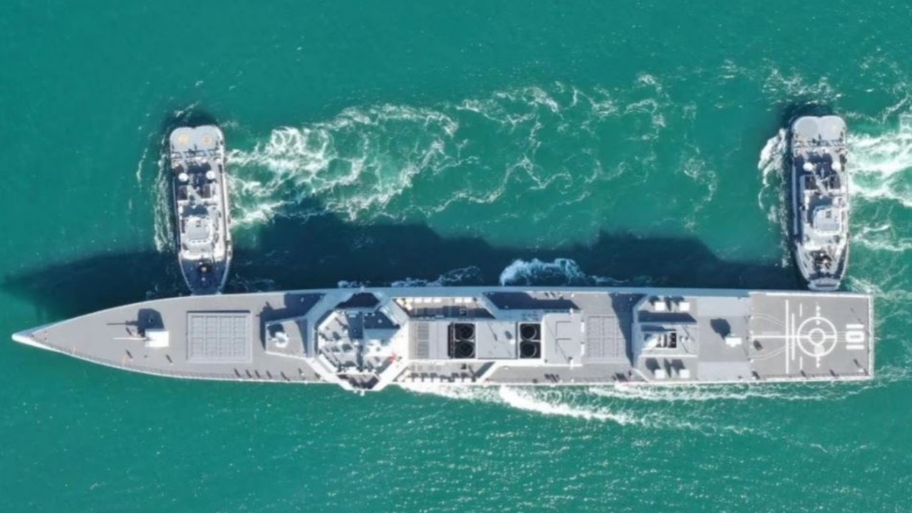 The Type 055 Nanchang being manoeuvred by tugboats. This top-down view provides a good look at the numbers of VLS cells positioned forward and amidships. Picture: PLA/Weibo