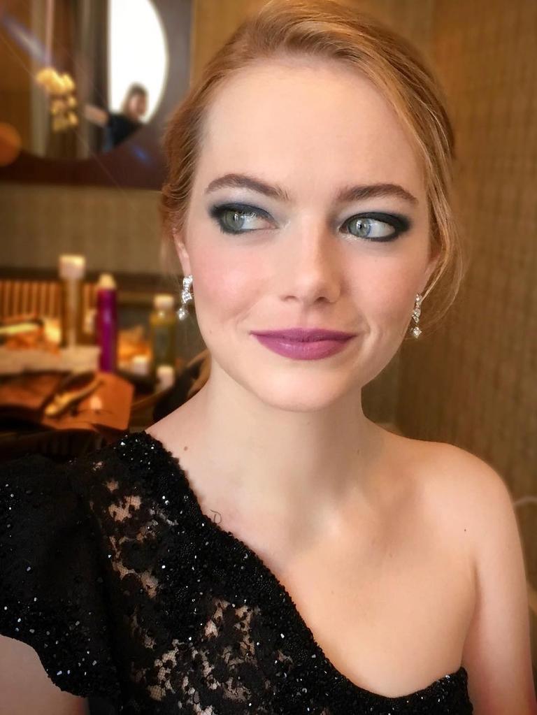 Emma Stone ... "This woman’s strength and beauty truly know no bounds. #emmastone heading to the #goldenglobes red carpet tonight. Emerald green eyes and violet stained lips #rachelgoodwinmakeup for NARS #narsissist Who said black has to be boring??" Picture: @rachelgoodwinmakeup/Instagram