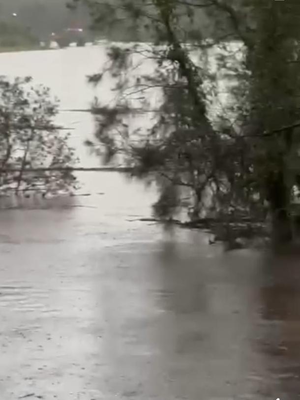 Mudgeeraba Rd is underwater as intense rainfall lashes the Gold Coast. Picture: Supplied/Facebook