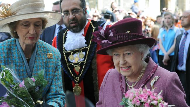 Queen Elizabeth ll, accompanied by her lady-in-waiting, Lady Susan Hussey.