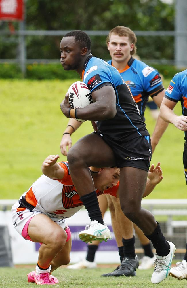 Emarly Bitungane charges forward with the ball in the Hostplus Cup Queensland Rugby League match between the Northern Pride and the East Brisbane Tigers, held at Barlow Park. Picture: Brendan Radke