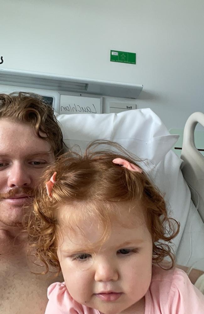 Dalby roofer Lauchlan Tucker with his daughter.