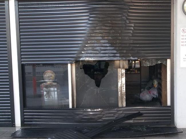 Huff & Puff Tobacconist store in Logan Central Plaza engulfed in flames overnight. Photo: Supplied