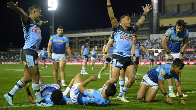 The Sharks celebrate Jesse Ramien’s try. Photo by Brett Hemmings/Getty Images