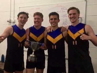 Ben Jepson with Matt Rowell, Nick Daicos and Noah Anderson after Carey Grammar's 2019 APS premiership.