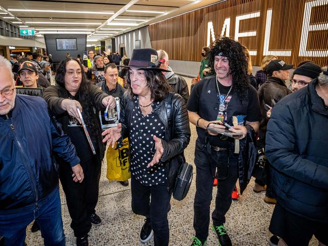 Paul Stanley signs autographs for fans upon arrival at Melbourne Airport to begin the Australian leg of the End of the Road Tour. Picture: Jake Nowakowski