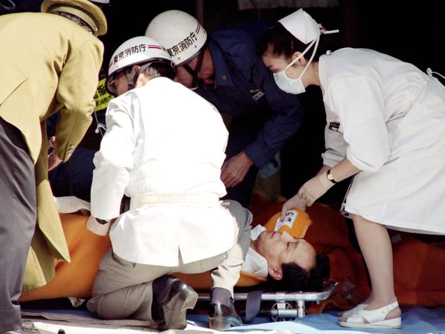 Medical personnel treat commuters injured in the subway attack on March 20, 1995. Picture: AFP