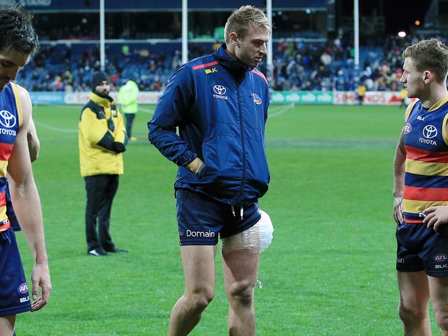 Daniel Talia finished the game on the bench with ice on his thigh. Picture: Wayne Ludbey