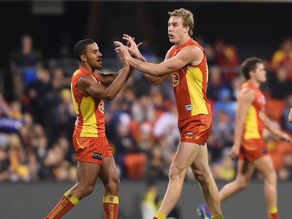 Touk Miller confronted Tom Lynch when the latter departed for Richmond. Picture: AAP