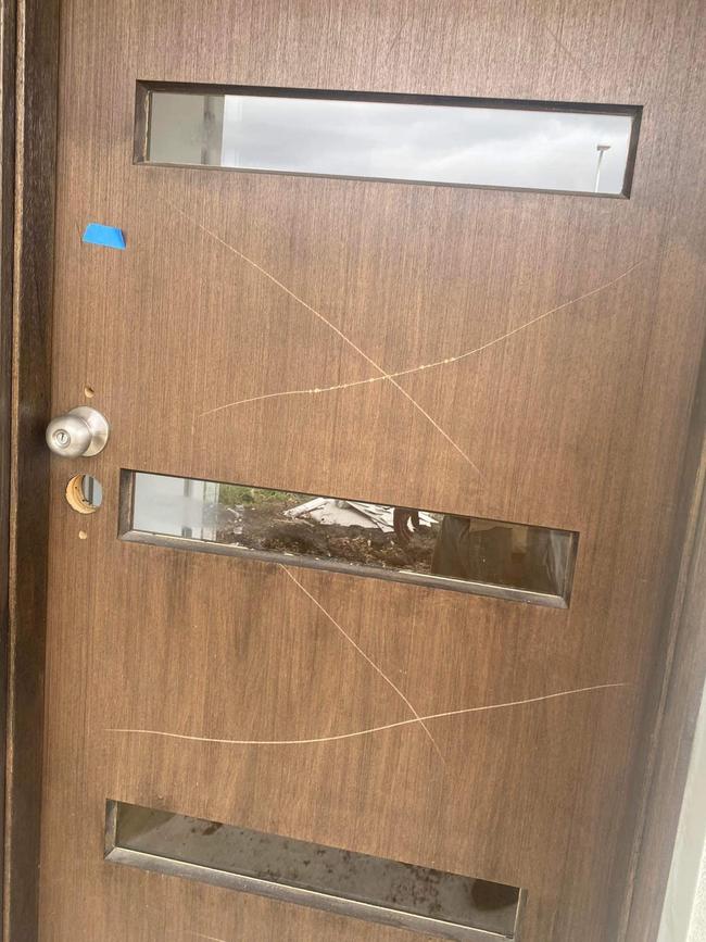 All doors were scratched with a knife.