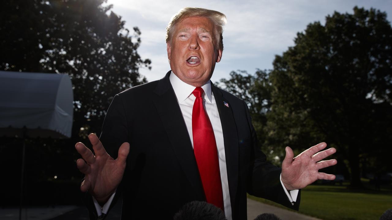 US President Donald Trump talks with reporters before departing on Marine One for the Air Force Academy graduation ceremony in Washington. Picture: AP Photo/Evan Vucci