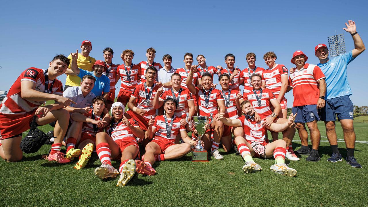 Palm Beach Currumbin players and coaches - Don and Johnstone, left, Maccan and Zimmerle, right, celebrate winning the NRL Schoolboy Cup grand final. Picture Lachie Millard