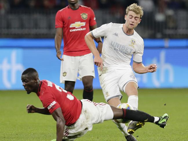 Leeds United striker Patrick Bamford has a shot blocked by Manchester United’s Eric Bailly on Wednesday night. Picture: Getty Images