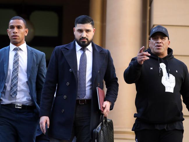 Will Hopoate, lawyer Mahmoud Abbas and ex NRL star John Hopoate outside Central Local Court on Wednesday. Picture: NCA NewsWire / Christian Gilles