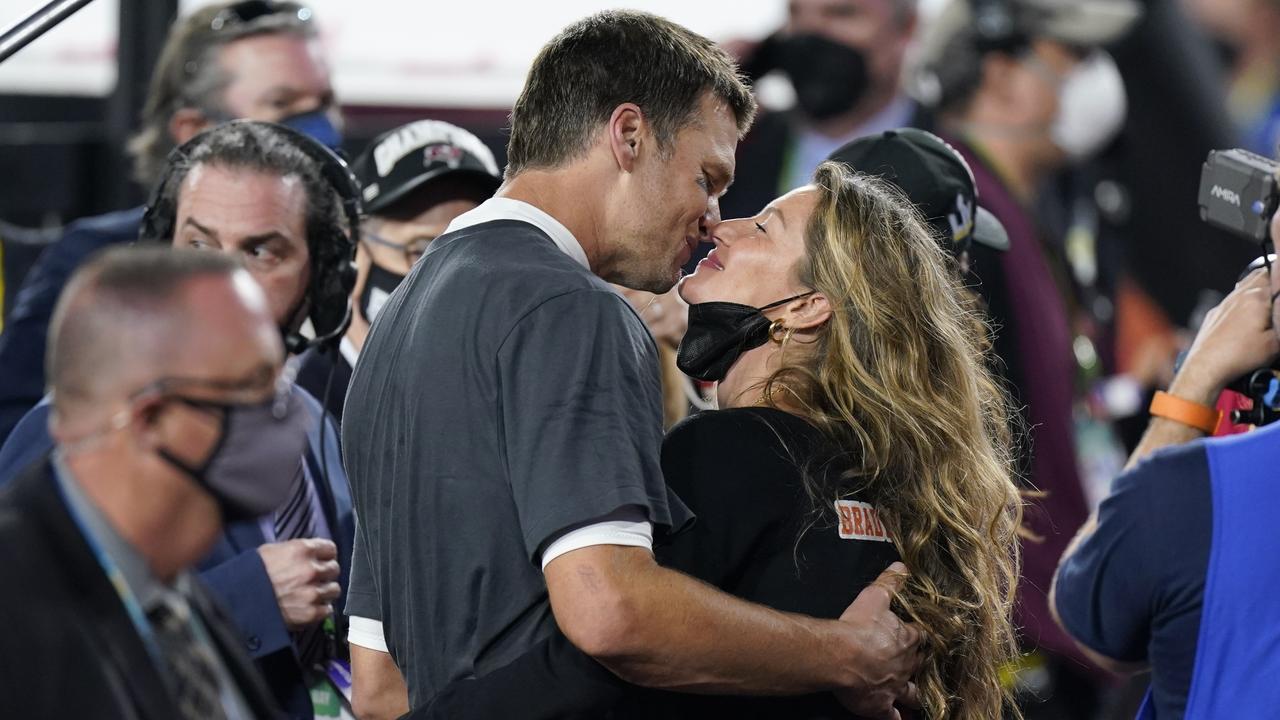 Tampa Bay Buccaneers quarterback Tom Brady kisses wife Gisele Bundchen after winning NFL Super Bowl 55. Photo AP Photo/Mark Humphrey.