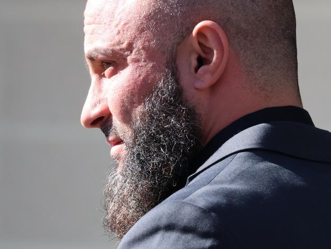 Mohamed Abdullatif Arnaout leaves the ACT Magistrates Court on June 26, 2024, when he faced a sentence hearing on a charge of failing to comply with an order made by a magistrate. Picture: Blake Foden