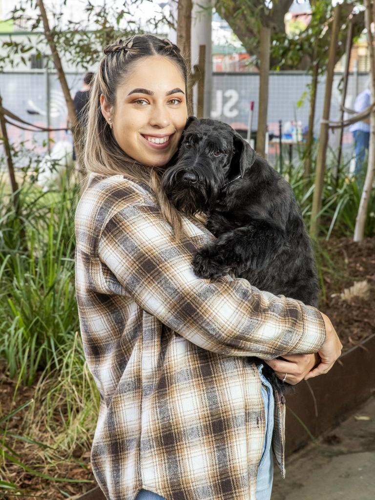 Tahlia Baines with Elle the Miniature Schnauzer at the Ekka at the RNA Showgrounds in Bowen Hills on Thursday. Picture: Richard Walker