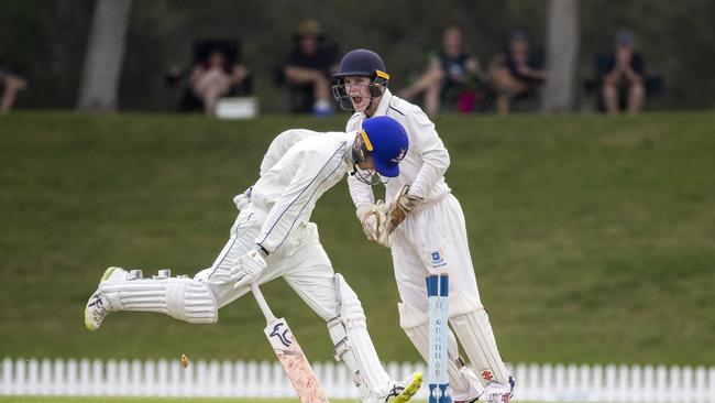 Brisbane Grammar keeper Matthew Lockhart appeals against Campbell Corrigan. (AAP Image/Richard Walker)