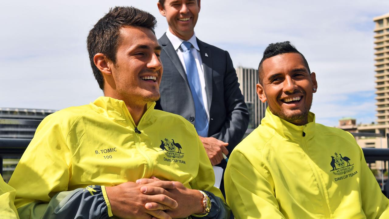 Bernard Tomic and Nick Kyrgios. Photo: / AFP PHOTO / William WEST